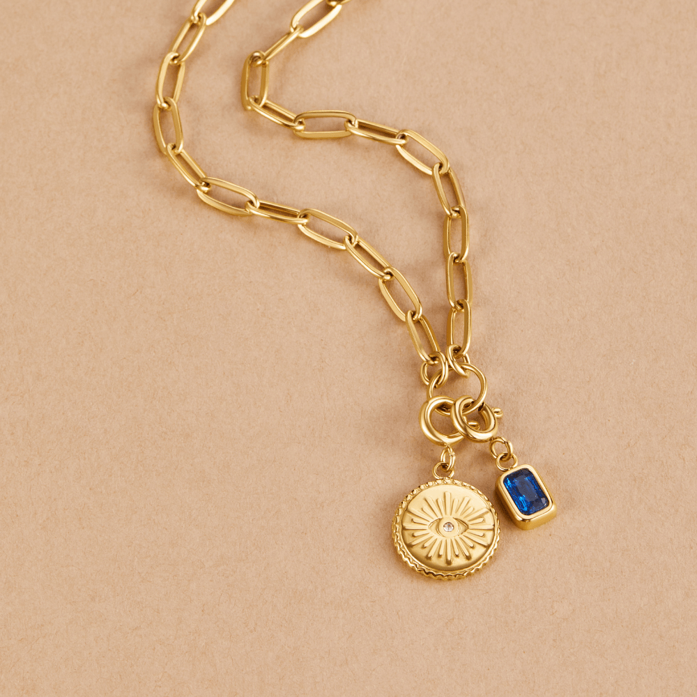 'The Truth' Gold Eye Coin Charm